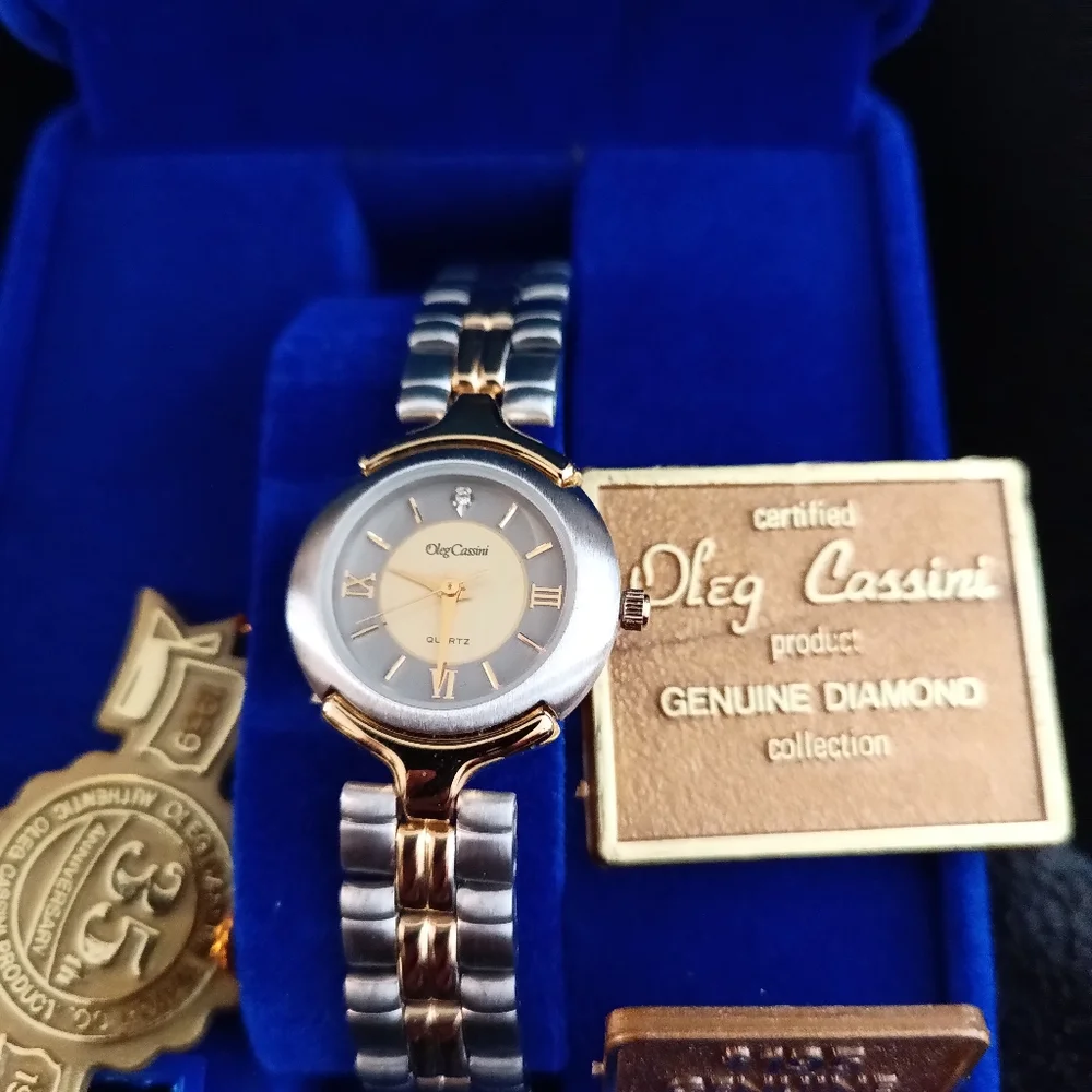 Oleg Cassini Vintage NIB genuine diamond watch two toned gold and silver